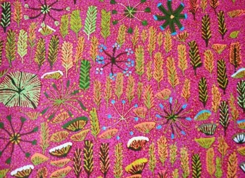 Close up detail of pink Aboriginal culture wallpaper.