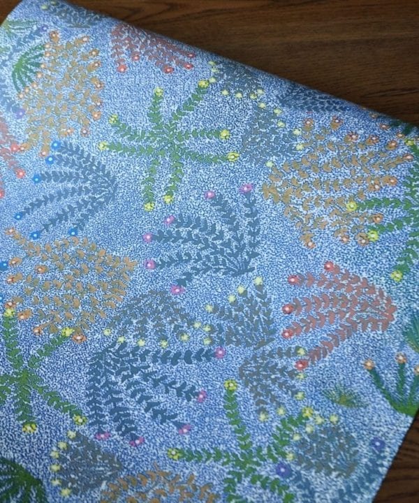 Overhead shot of a floral Aboriginal wallpaper.