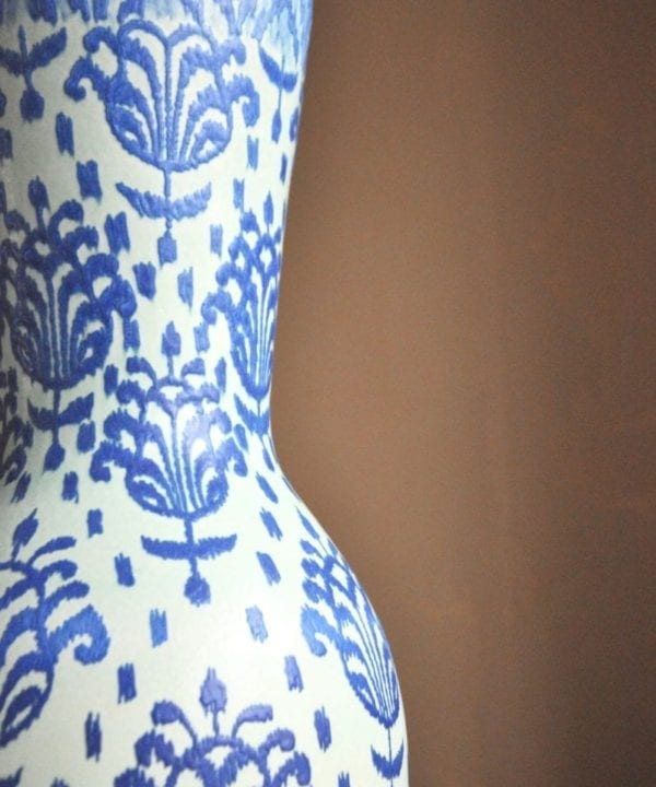 Thai-style motifs on a Thai pottery pot in blues.