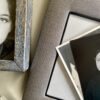 A grey silk photo frame handmade in Thailand.