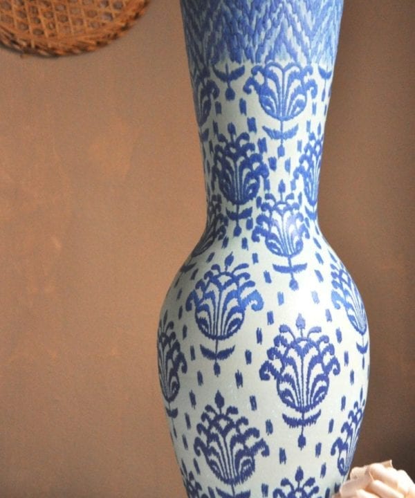 A tall, blue on blue, hand-decorated ceramic pot from Chiangmai, northern Thailand.