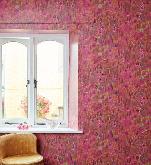 A styled, in situ shot around a window of 'Betty' Aboriginal culture wallpaper in pink.