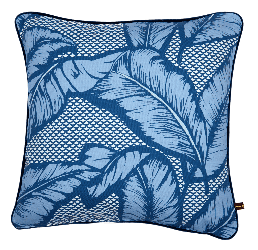 A blue banana leaf print cushion available through TelescopeStyle.com.