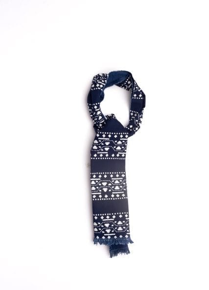 An indigo blue cotton scarf with a relief-printed decorative stripe design.