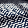 Detail of the indigo Eastern lattice print cushion fabric from Blue Handed through Telescope Style.