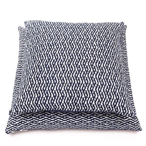 Indigo blue cushions in two sizes showcasing a typical Chinese lattice design, handmade using the ancient art of relief printing.