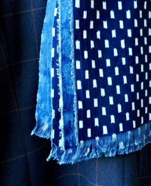 Close-up of a handmade indigo blue scarf.