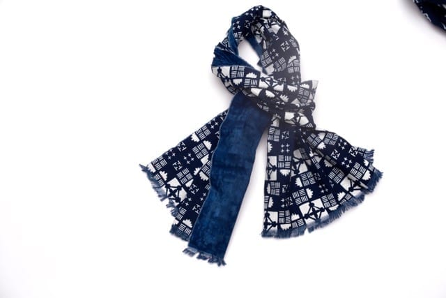 An indigo blue geometric print scarf.