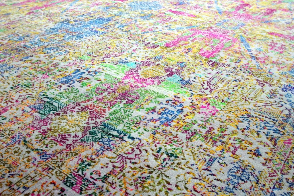 Detail of a modern, multi-coloured Persian-style rug design.