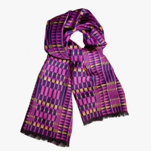 A pink, cashmere wrap scarf with mustard accents and a geometric weave.