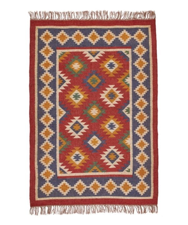 An Aztec, geometric red rug with blue border.