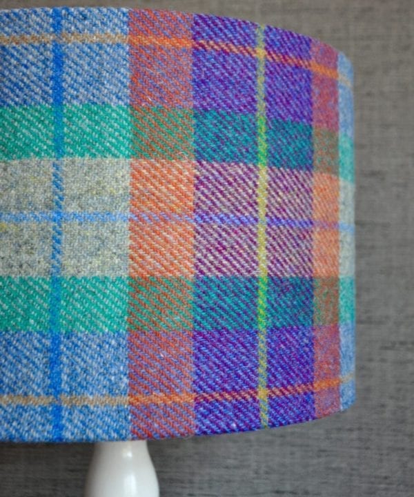 A shot of a colourful Harris tweed check drum shade available to order through Telescope Style.