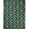 A green trellis rug handmade in India. The flatweave is in a lawn green colourway.