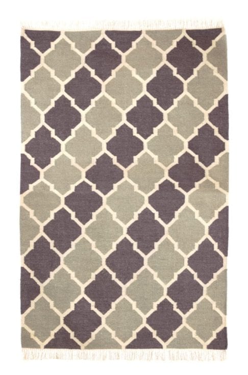 A flatweave, grey and white trellis rug handmade in India.