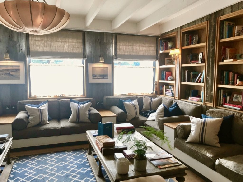 A cosy and inviting reading room at The Gallivant hotel and restaurant in Camber Sands near Rye in Sussex.