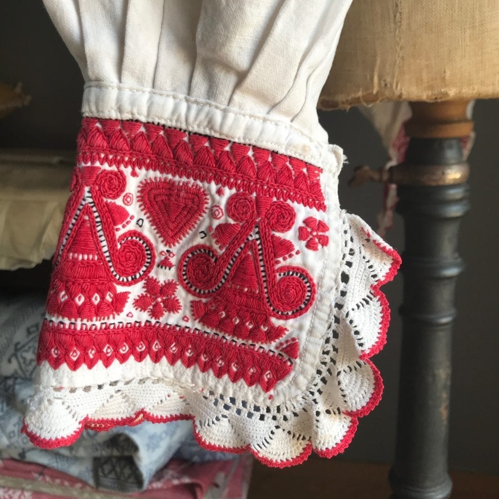 An embroidered cuff in red on an original Hungarian blouse from which textile designer Julia Brendel took inspiration.