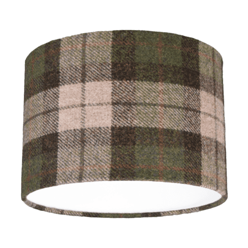 Cut out shot of a black, red and moss green check drum shade made from Harris Tweed.