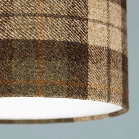 Detail of a Moss green check Harris tweed lampshade.