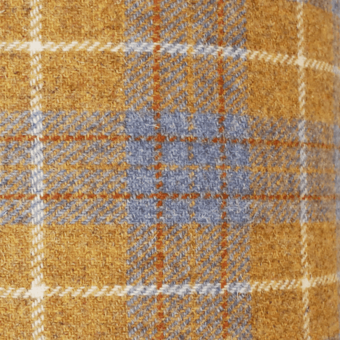 Close up shot of a Harris tweed check mustard drum shade.