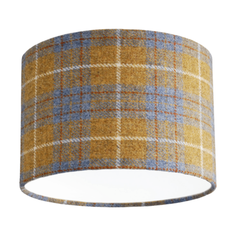 Cut out shot of a Harris tweed, grey and mustard drum shade available through Telescope Style.