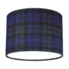 Cut out shot of a Black Watch tartan drum shade.