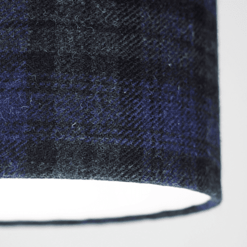 Detail shot of a Black Watch tartan drum shade made from Harris tweed.