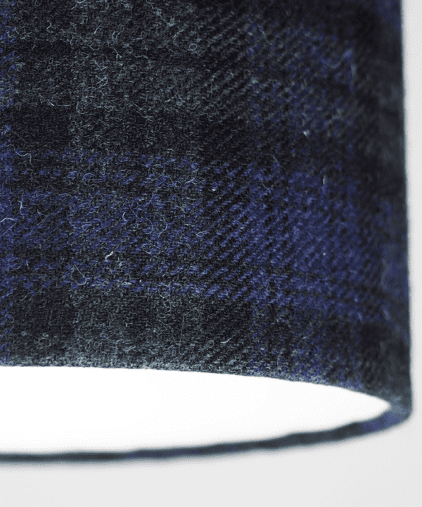 Detail shot of a Black Watch tartan drum shade made from Harris tweed.