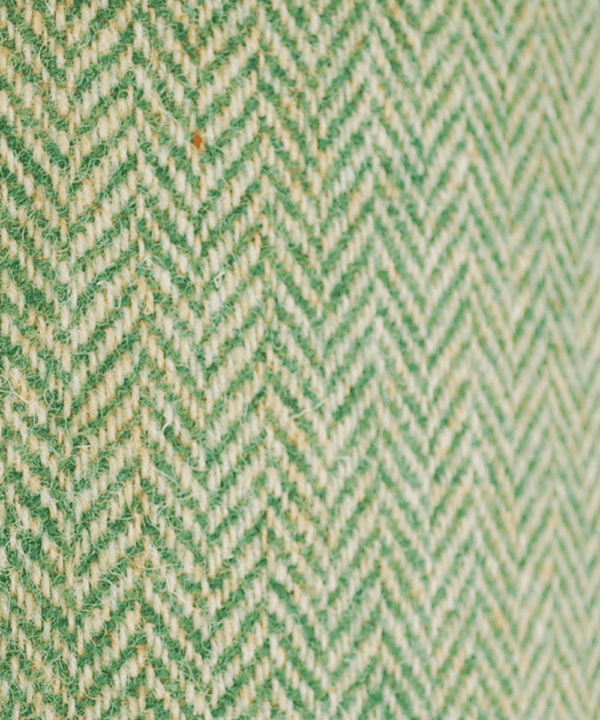 Detail of the herringbone pattern on a green tweed lampshade from the Isle of Harris.