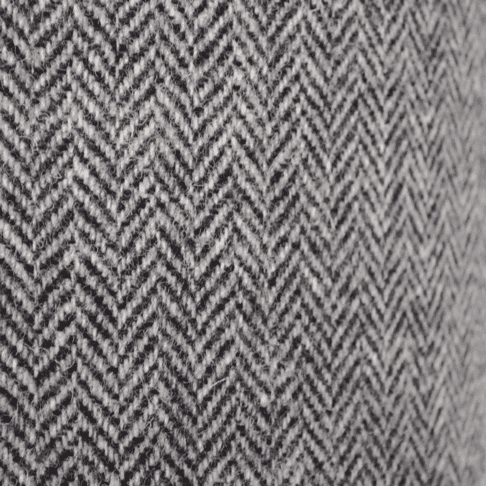 Detail of the herringbone pattern on a grey tweed lampshade from the Isle of Harris.