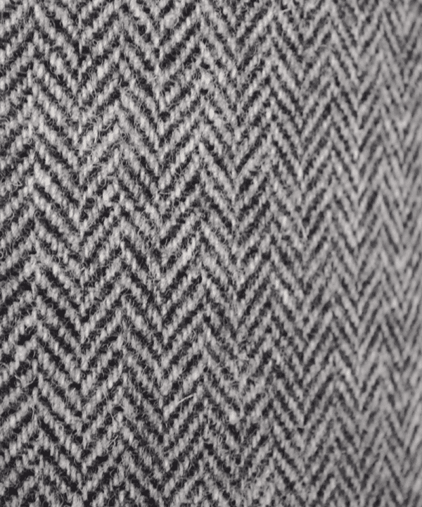 Detail of the herringbone pattern on a grey tweed lampshade from the Isle of Harris.