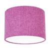 Cut out shot of a pink tweed drum shade with herringbone weave.