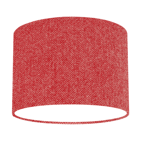 Cut out shot of a red tweed drum shade with herringbone weave.