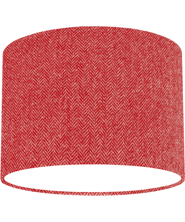 Cut out shot of a red tweed drum shade with herringbone weave.