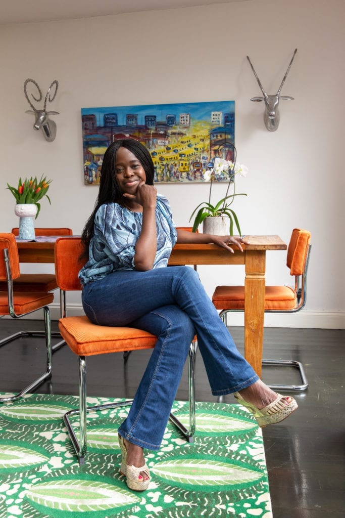 A portrait of textile designer Eva Sonaike in her own home.