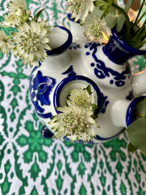 A Dutch tuipière flower vase in blue and white for easy flower arranging.