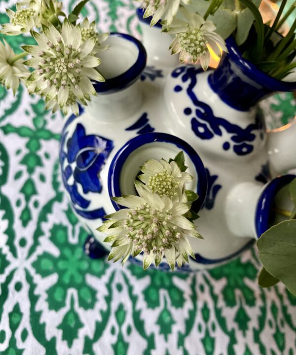 A Dutch tuipière flower vase in blue and white for easy flower arranging.