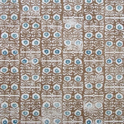 Fabric detail of 'Iznik' linen cinnamon brown patterned cushions.