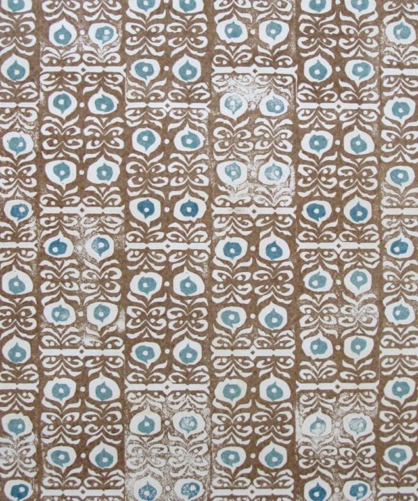 Fabric detail of 'Iznik' linen cinnamon brown patterned cushions.