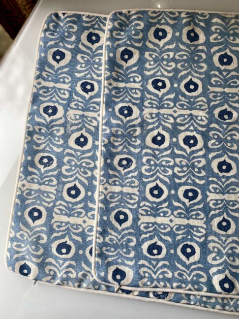 A pair of hand-print linen cushion covers in an Iznik hand-print design.