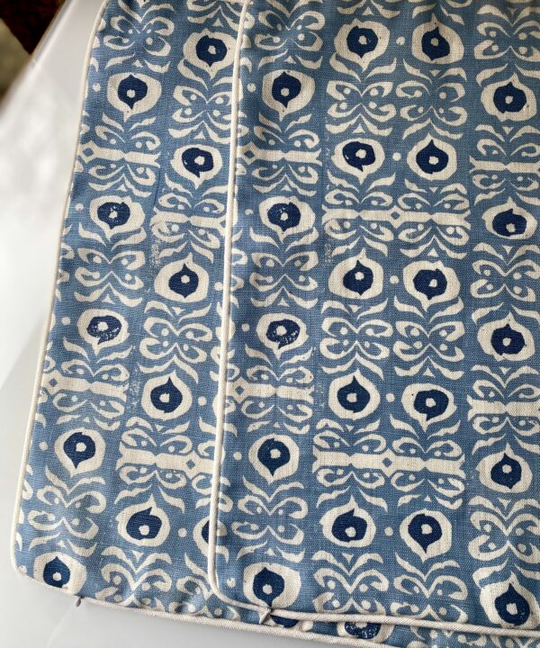A pair of hand-print linen cushion covers in an Iznik hand-print design.