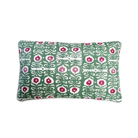 A rectangular, hand-printed linen green patterned cushion inspired by Middle Eastern motifs in red and green.