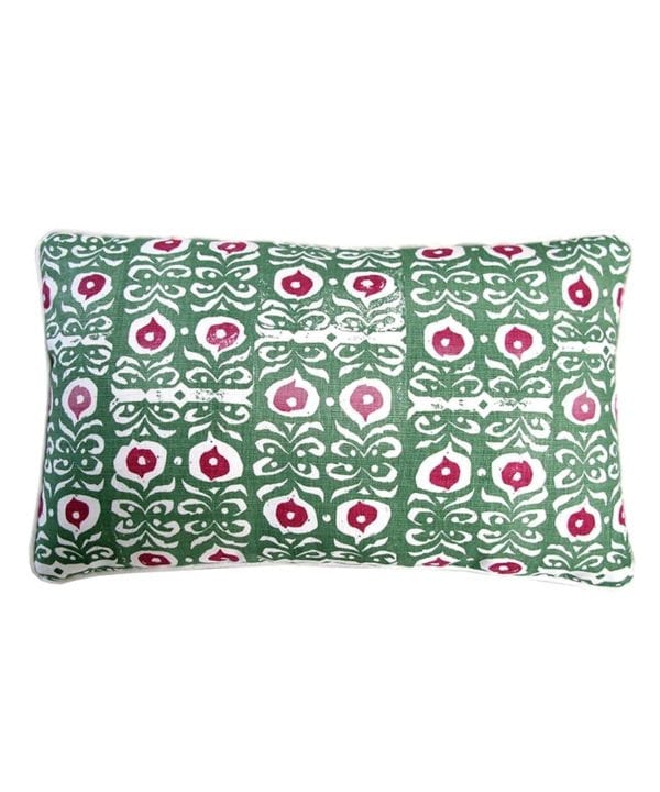 A rectangular, hand-printed linen green patterned cushion inspired by Middle Eastern motifs in red and green.