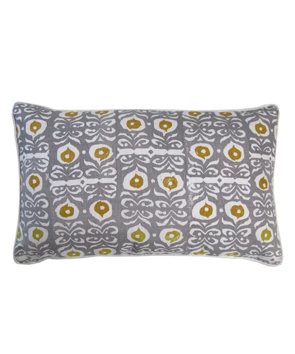 Grey patterned cushions in linen with acid yellow accents depicting a stylised, Middle Eastern motif hand-print.