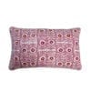 Pink patterned cushions with a culturally-inspired, decorative, Middle Eastern motif on hand-printed linen.