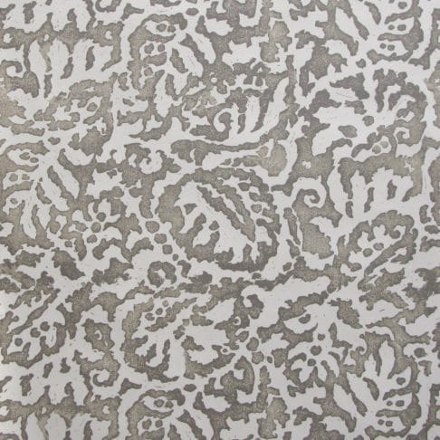 A close up of the Majolica, Italian inspired grey patterned wallpaper in a warm grey with a pale off-white ground.