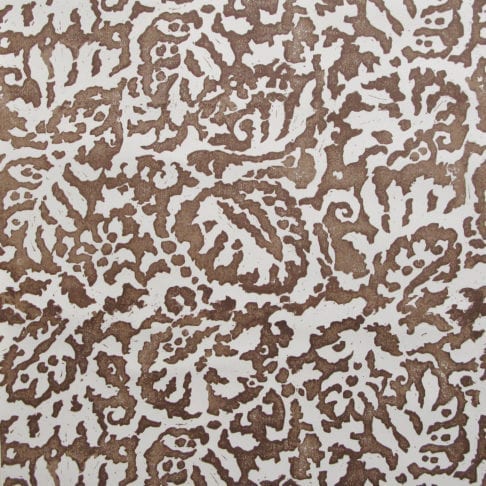 A close up of the Majolica, Italian inspired brown patterned wallpaper in earthy-hued Gaucho with a pale, off-white ground.