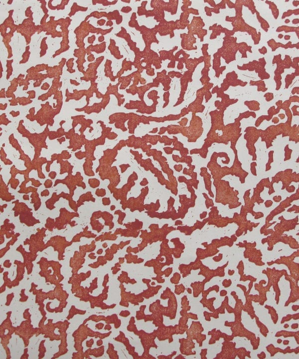 A close-up shot of an Italian palazzo inspired burnt orange wallpaper from Telescope Style.