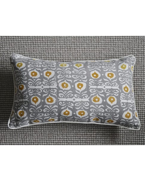 A grey and gold, hand-print linen lumbar cushion with an Iznik design.