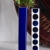 Japanese blue bud vases with polka dot and plain decoration.