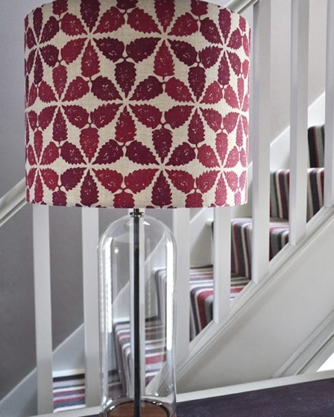 Detail shot of a red patterned lampshade in 'Maroc'.